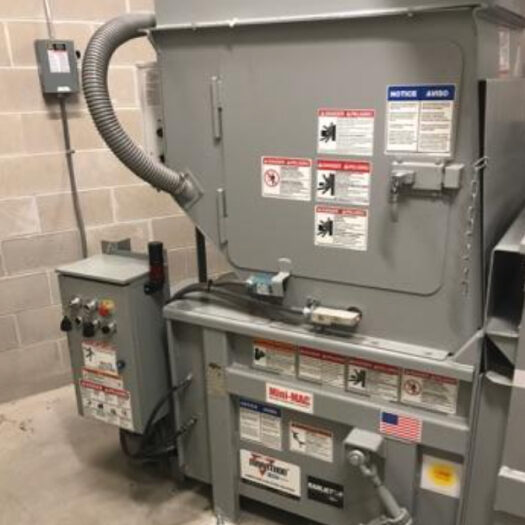 Equipment detail _ Apartment Trash Compactors-1 cra gray apartment trash compactor